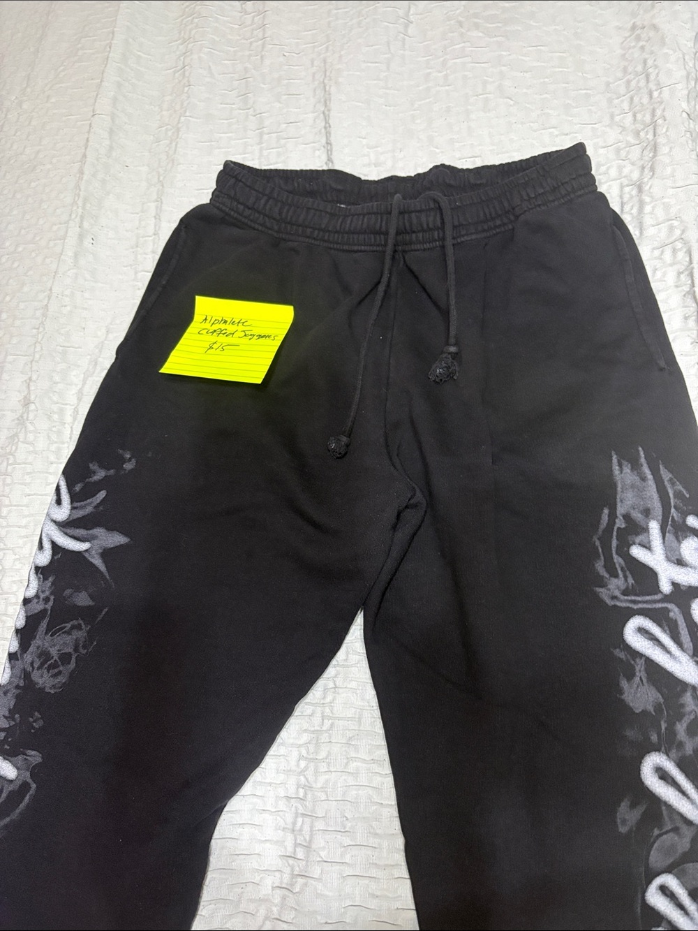 Alphalete Black Track Joggers with White Graphic Side Prints